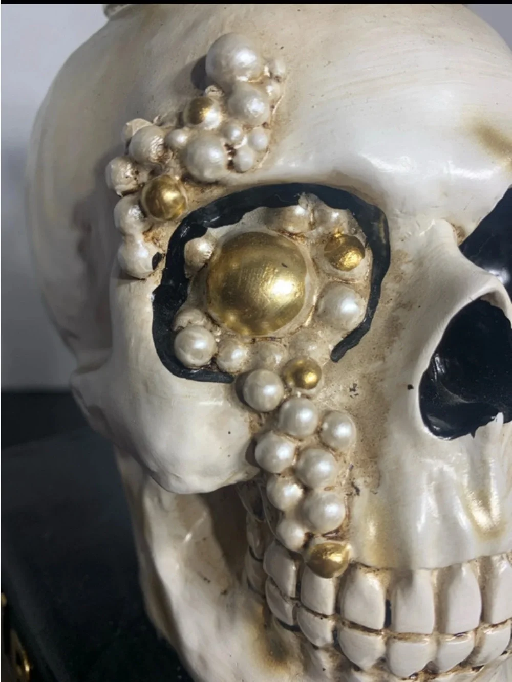 Decorative White and Gold Skull on Stacked Spell Books - Home Accent